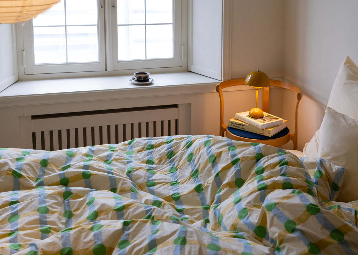 ベージュの掛け布団カバーにドットチェックグリーン