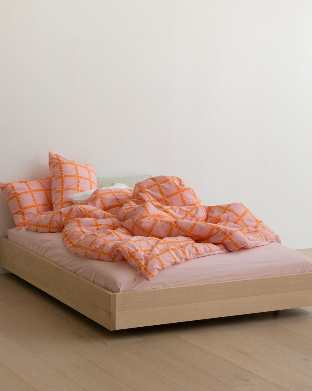 ピンクのフィットシーツ